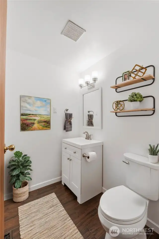 Powder room located down the hall on the main floor.