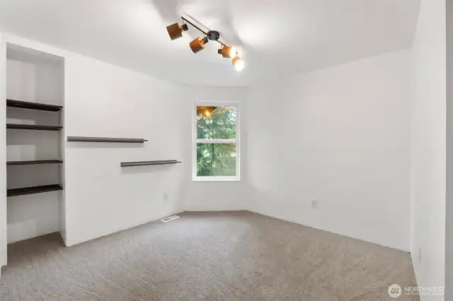 Second of two guest bedrooms located upstairs.