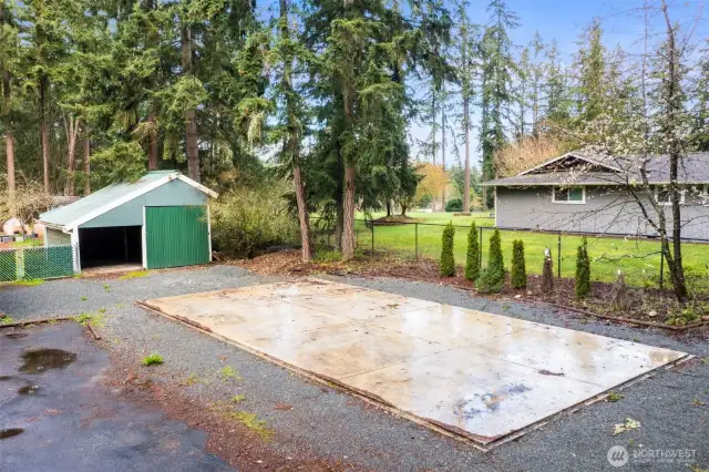 One of the two outbuildings for all of your DIY projects or additional storage. This large monolithic slab is ready for you to construct a shop, covered parking, basketball court or??? The possibilities are endless.