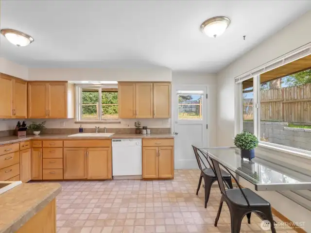 This charming eat-in kitchen offers the perfect blend of function and comfort, with space for a cozy dining table where memories are made over morning pancakes or evening meals.