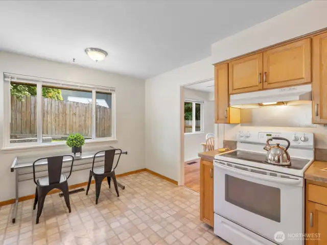 Whether you're enjoying your morning coffee or preparing a family meal, the kitchen is filled with warmth and light.