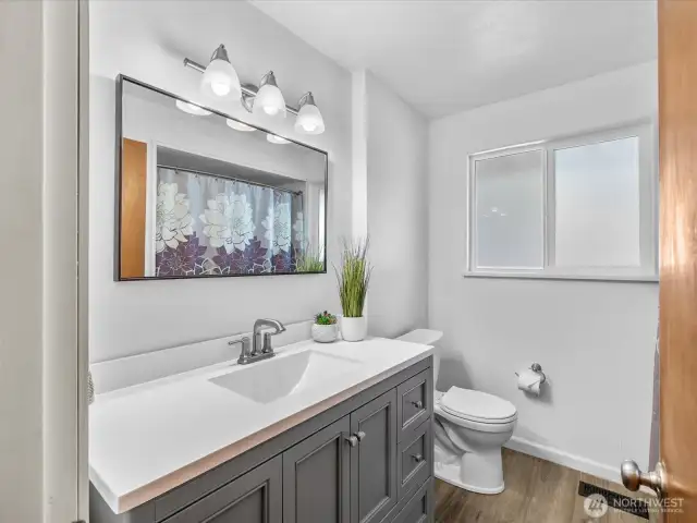 Step into a beautifully updated bathroom where modern touches meet everyday comfort.