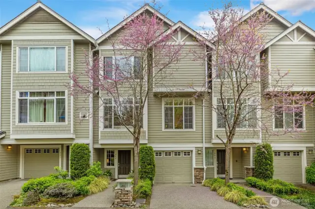 Welcome to this beautifully updated residence nestled in The Aspens, a serene townhome community in the heart of Bellevue's Wilburton neighborhood