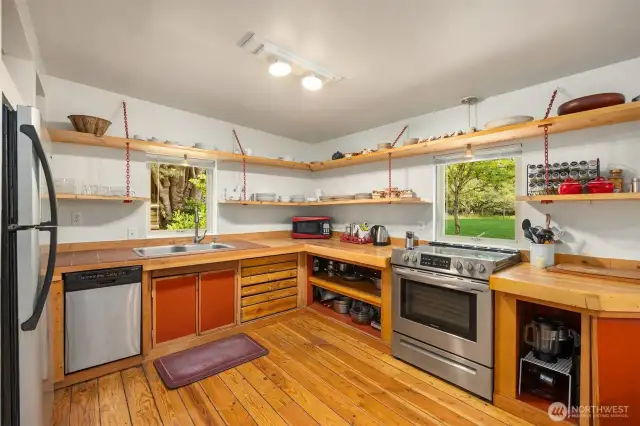 I can smell pie cooking in this kitchen. No it is not modern at all, but it is large and welcoming.