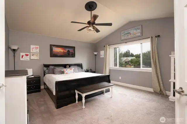 Primary suite with French doors to welcome you in.