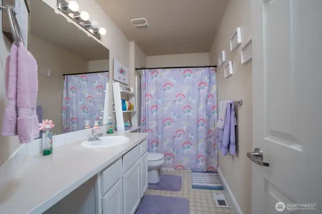 Full bathroom in hallway.