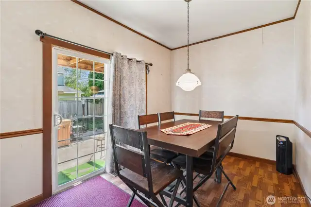 Formal dining room - or could be used as flex space - leading out to patio.