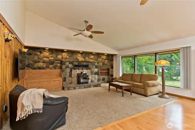 Wood burning stove surrounded by stone.