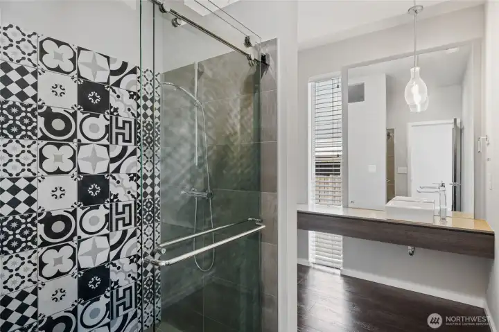 Main floor powder room converted with custom shower