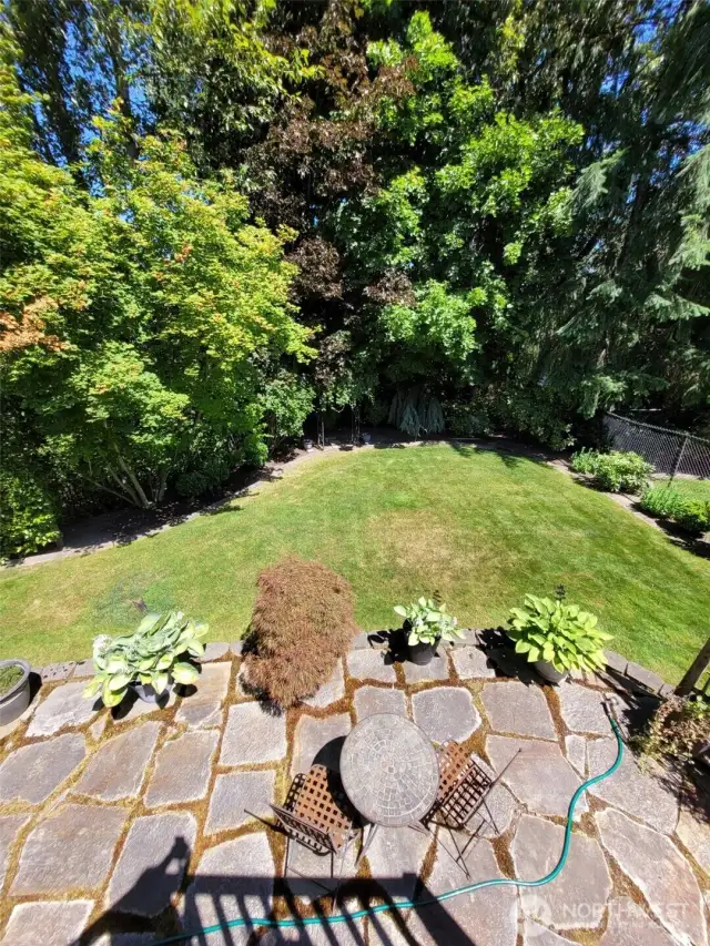 Stone patio off the back decks