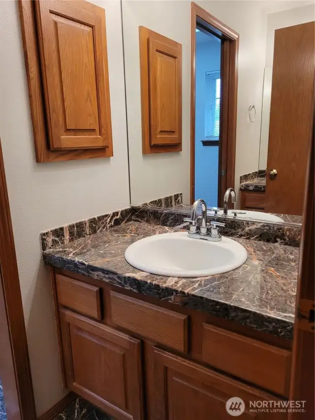 Just 1 of the 2 sink areas in the guest bathroom upstairs, great for getting ready for school or the day at the same time!
