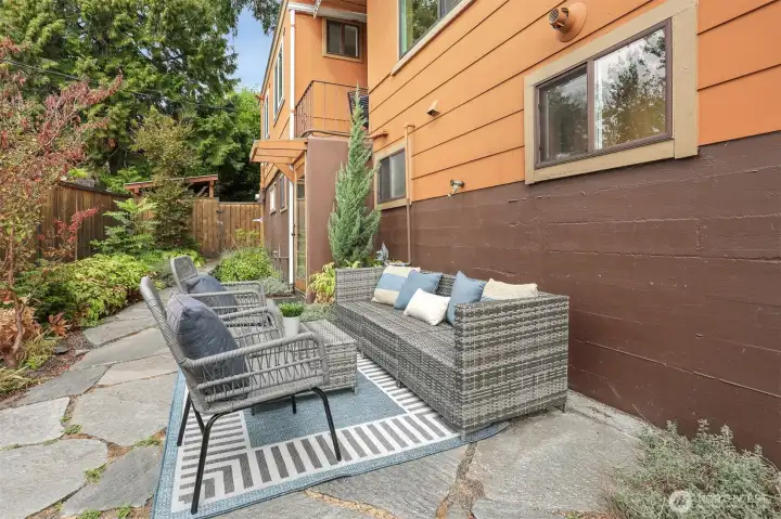 Professionally architect designed ($50,000 project)  fenced courtyard with access to the Main south home lower level and custom built cedar shed.