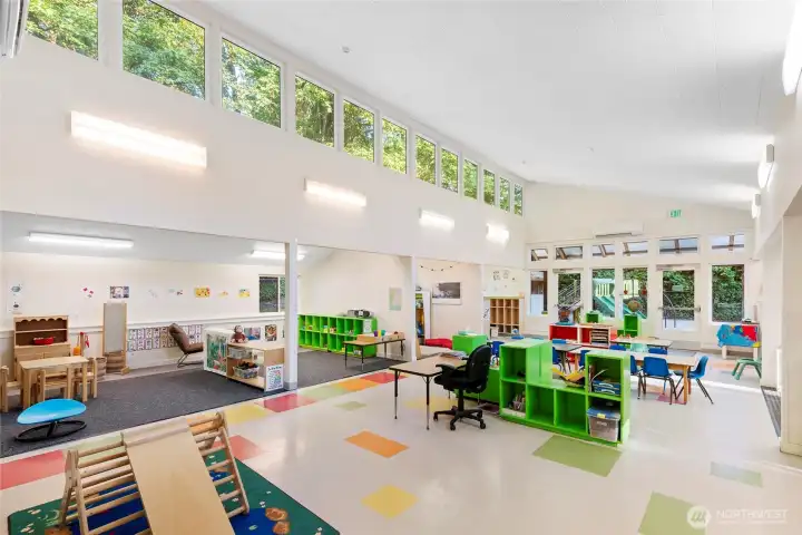 Open floor plan with multiple activities areas.