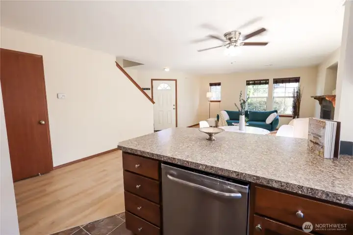 Overlooking the living room and dining area from kitchen. The door leads to the wardrobe which could be used as a pantry. The other door leads to 0.5 bath