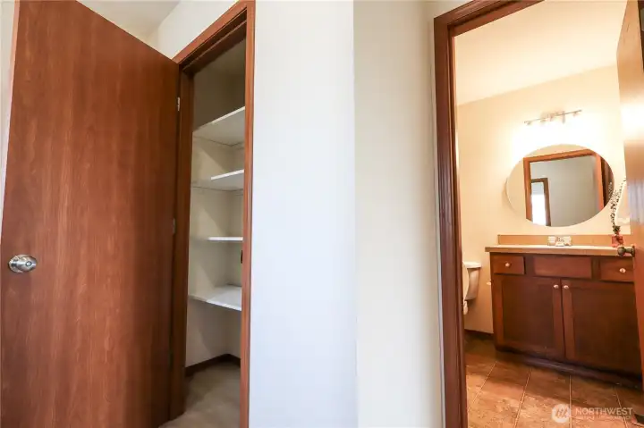 The linen closet and full bathroom on the second floor