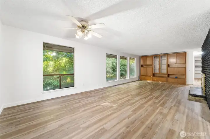 Formal dining & seating area with a second fireplace for those warm cozy nights