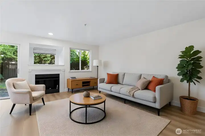 Spacious living room connecting seamlessly to the dining area—ideal for everyday living. Virtually Staged