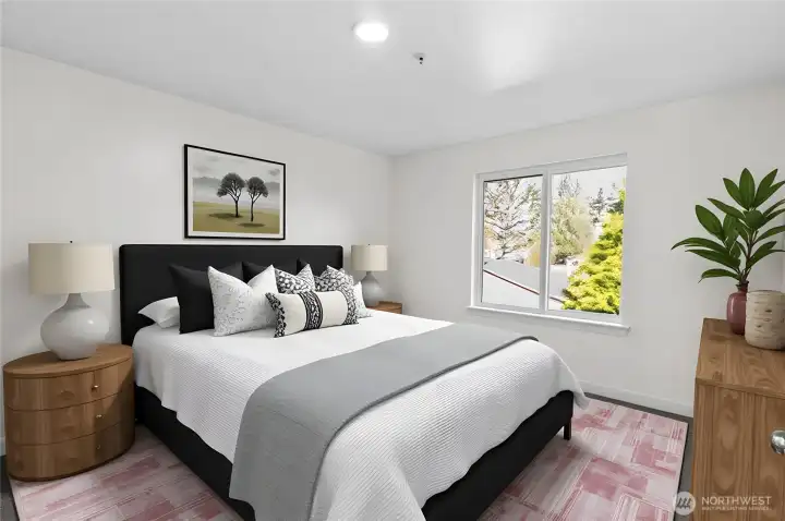 Second bedroom with updated flooring and a large closet—ideal for guests or home office use. Virtually Staged