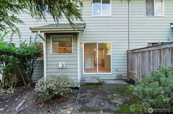 Simple, low-care outdoor space ideal for relaxing or setting up a small garden.