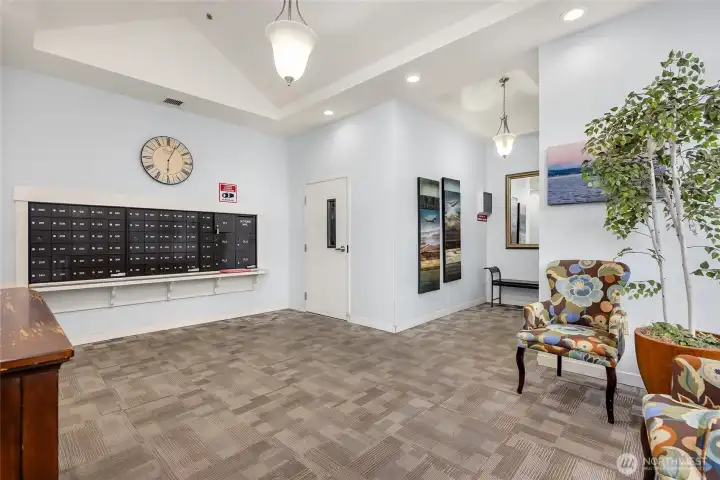 Spacious Lobby with secure access and elevator foyer. Your mail and precious packages await.