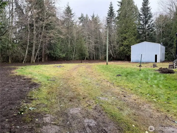 A portion of cleared building site on the property