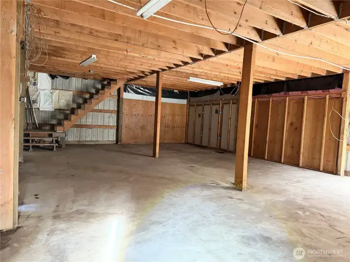 Inside the garage. Stairs leading to the upper level