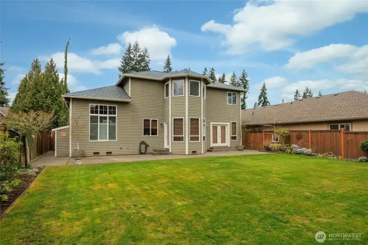 Large level backyard. Back of home plumbed for gas for your BBQ, w/water & power also.