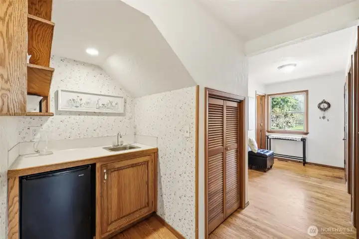Off the back entry is a wet-bar with a mini-refrigerator.