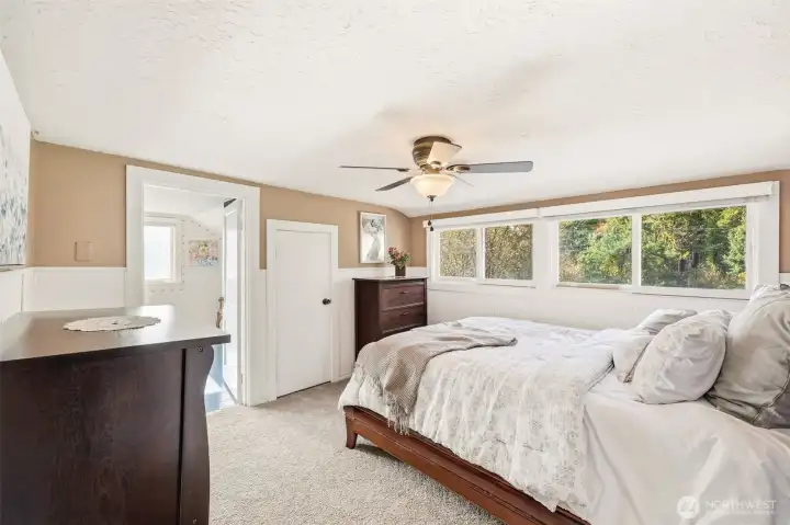 2 of 3 upper bedrooms. The door leads to an office or it could be a huge walk-in closet.