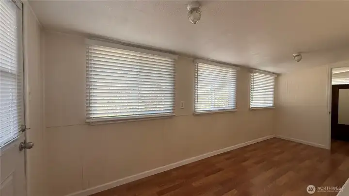 entry with finished extra room office at end of room