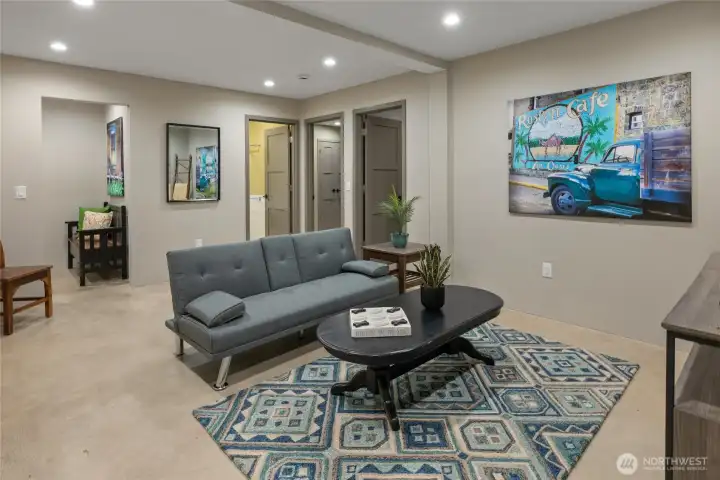 On the left, there is an entrance door and entry way on this floor as well for convenient access. You can also see the entrance to the lower floor restroom and 2 bedrooms.