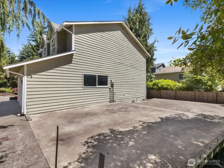 Poured concrete slab to allow for a 3rd car Garage and  possible ADU?