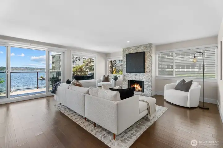 Gleaming engineered hardwoods throughout the entire home make cleaning a breeze. Gather around the cozy woodburning fireplace on those crisp and cool evenings. Gleaming engineered hardwoods throughout the entire home make cleaning a breeze. Gather around the cozy woodburning fireplace on those crisp and cool evenings.