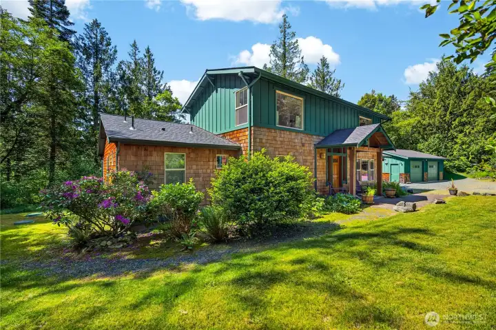 The beautiful home with detached two-car garage beyond. The beautiful home with detached two-car garage beyond.