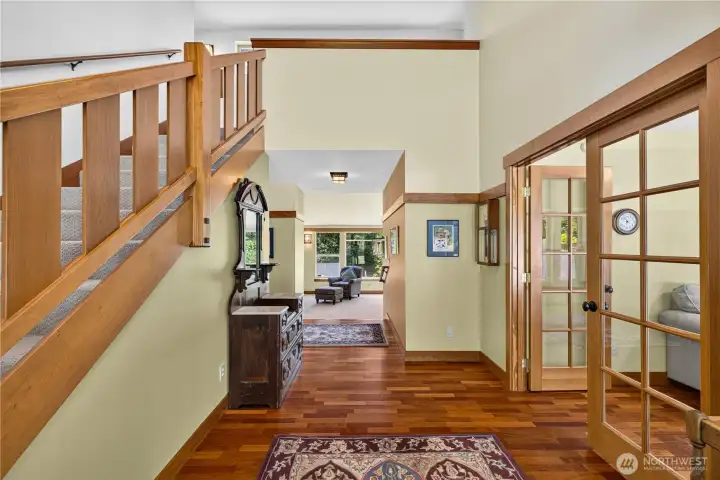 The view from the front door. Custom woodwork, beautiful wood floors; den is to the right. The view from the front door. Custom woodwork, beautiful wood floors; den is to the right.