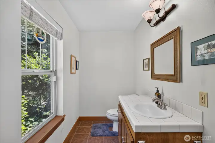 Half bath just off the laundry room Half bath just off the laundry room