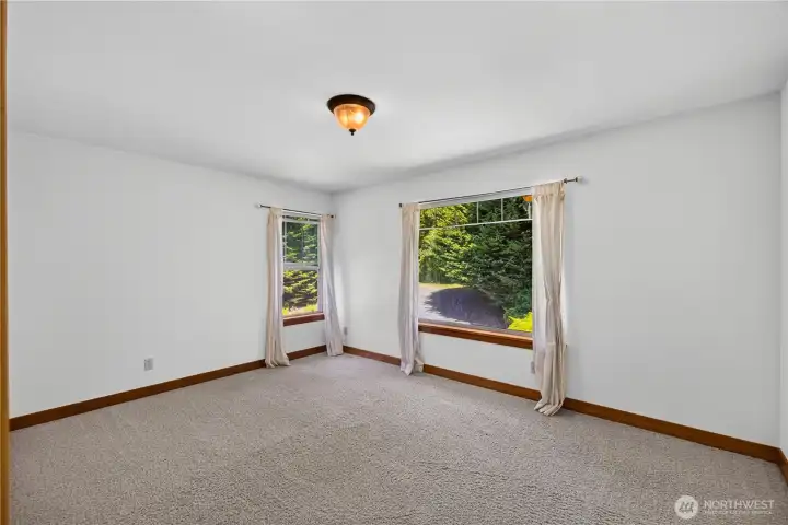 View from the door to one of the upstairs bedrooms, perfect for multi-generational or guest privacy View from the door to one of the upstairs bedrooms, perfect for multi-generational or guest privacy
