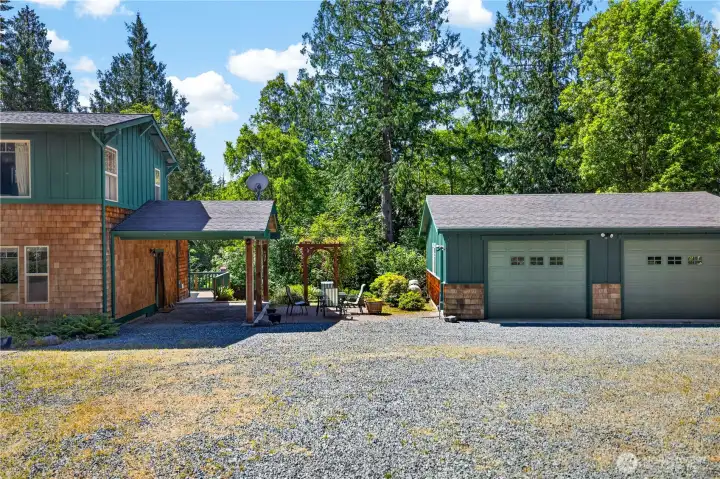 Spacious two car garage has room for workbench or studio space to create whatever you envision. Spacious two car garage has room for workbench or studio space to create whatever you envision.