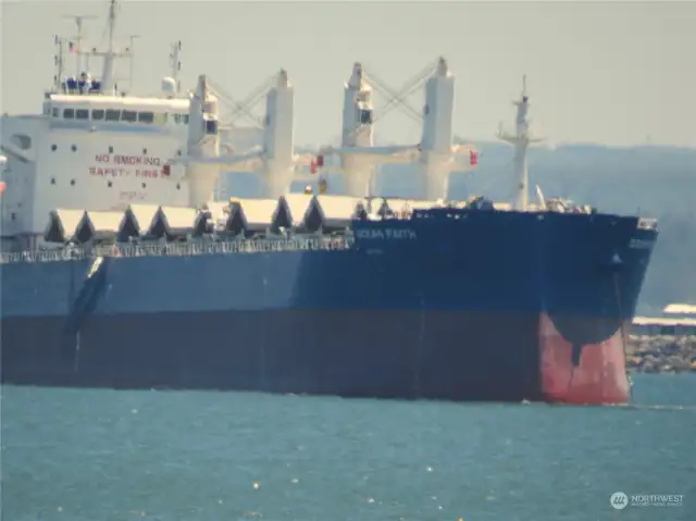 CLOSE-UP OF THE SHIP ANCHORED IN THE HARBOR