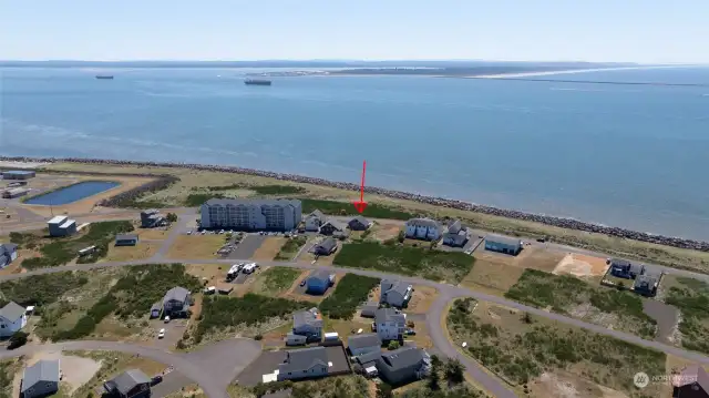 FROM THE NORTH VIEW OF THE HOME (ARROW) OUT TOWARD THE JETTY WITH SHIPS IN THE BACKGROUND!