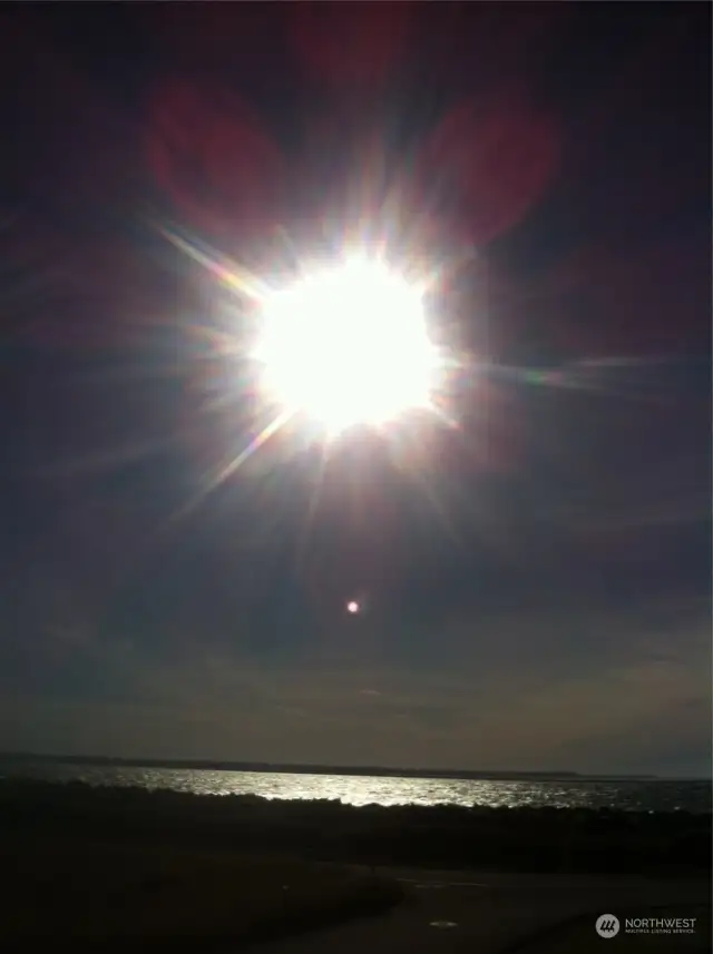 MOON SHINING ALONG THE JETTY