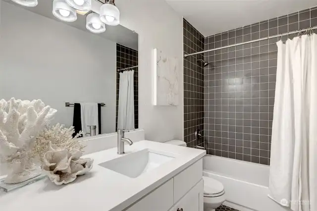 Additional view of the downstairs bathroom—showcasing contemporary details and a well-thought-out layout.