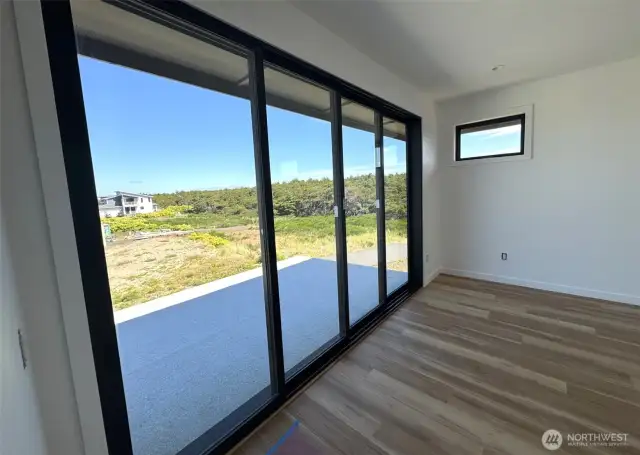 Primary Bedroom with sliding window wall...