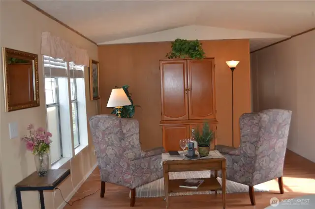 Vaulted ceilings make the living room feel extra spacious.