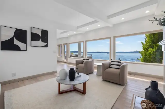 A wall of windows invites serenity and tranquility into every moment, offering breathtaking views from nearly every room.