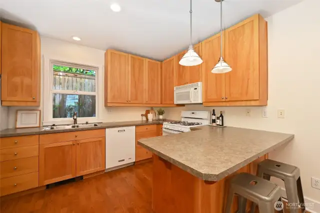 Kitchen is well planned with tons of storage, light and counter space.