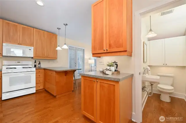 Another set of cabinets in the kitchen could be used as a pantry.