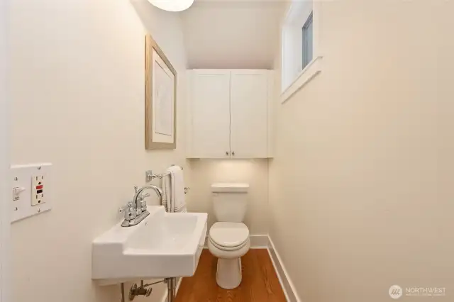 Powder room on main level off of kitchen.