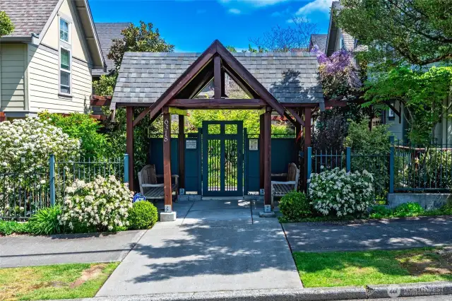 Notice how charming and welcoming this gated and secure front entry is.