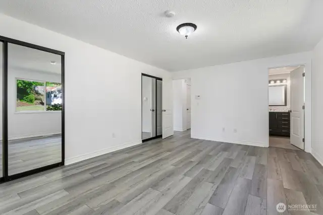 Primary bedroom boasts two large closets and en-suite